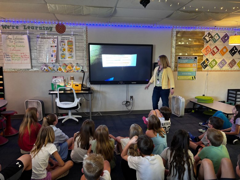 Chrissy Everett, a fourth grade teacher at Prairie Crossing Elementary in Colorado’s Douglas County, walks her students through an example of a written response.